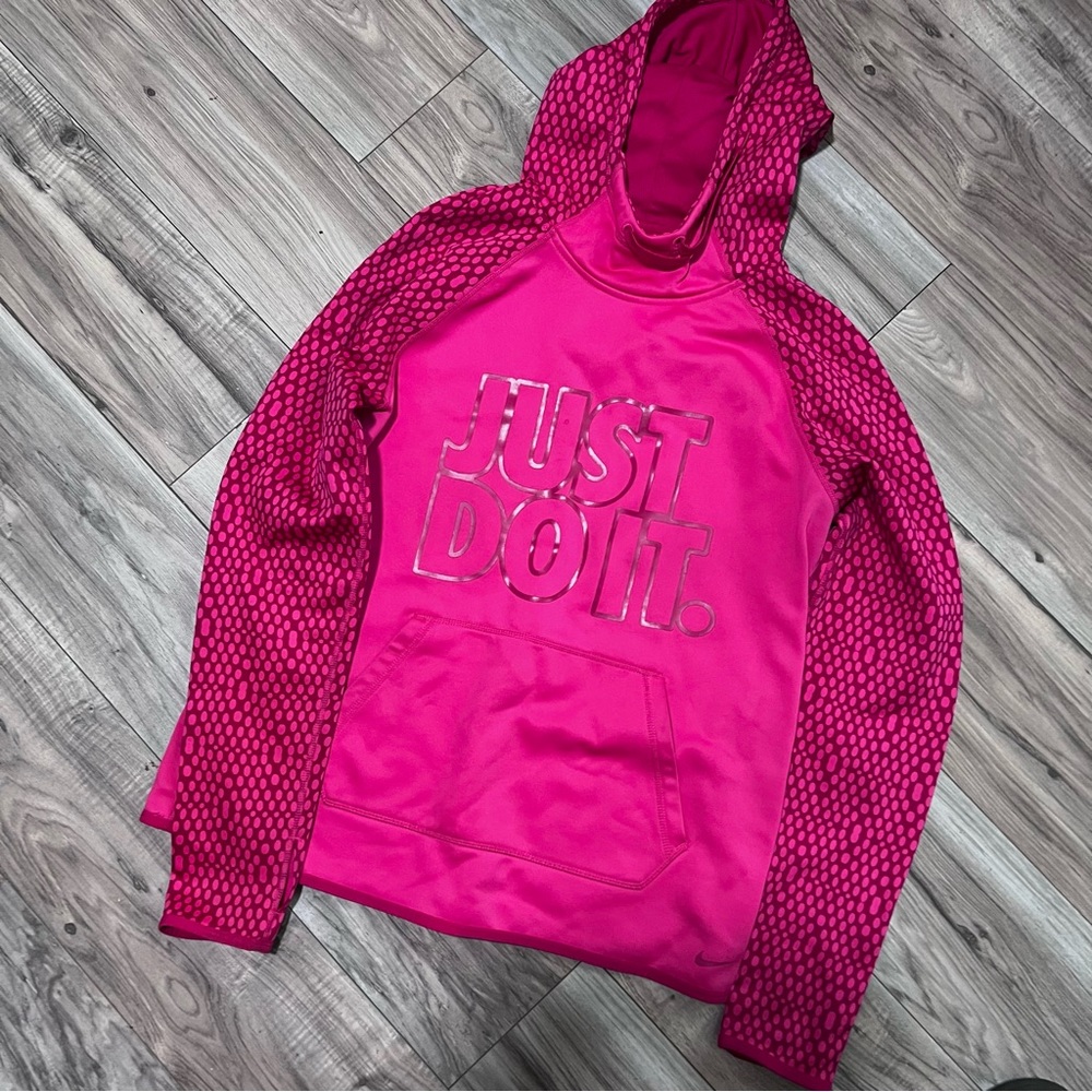 Pink two toned Nike hoodie.